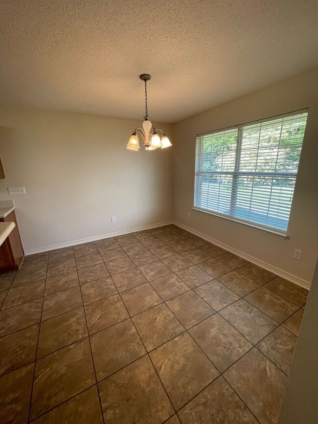 Building Photo - 4 BD/2 BTH   Located directly across from ...