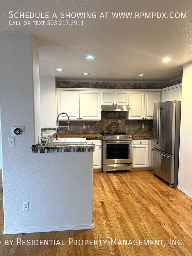 Building Photo - 6463 NW Wenmarie Dr