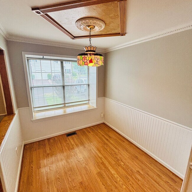 Building Photo - Spacious 3-Bedroom, 3-Bathroom Townhome with Finished Basement, Garage & Fenced Yard