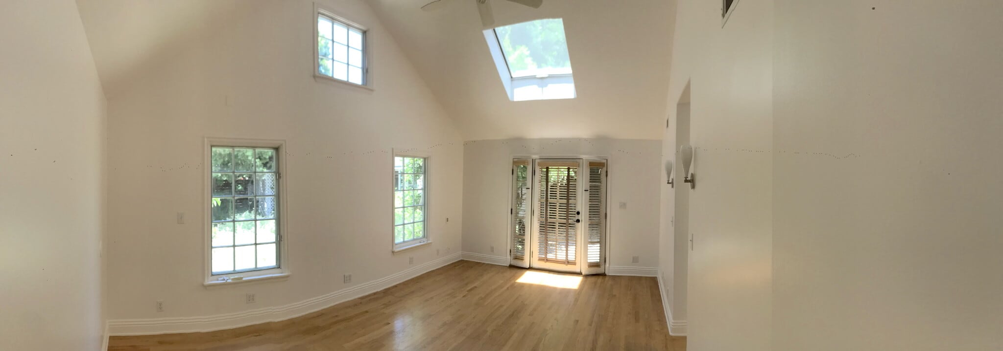 Primary Bedroom with Cathedral Ceiling, Skylight, Door to Courtyard - 325 S Berkeley Ave