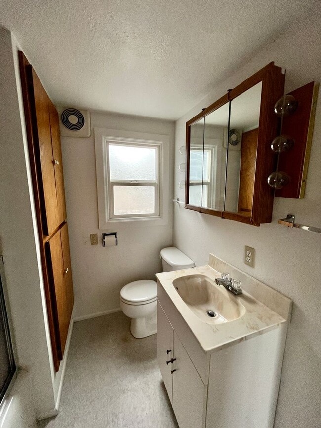 Building Photo - Cozy Single family home with two car garage and controlled access gate