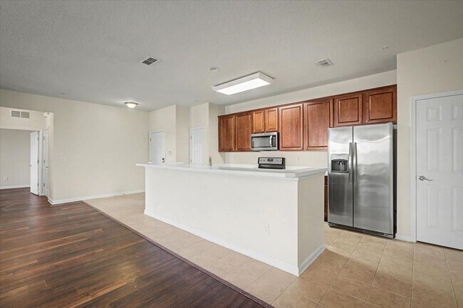 Building Photo - Peaceful Pond Views + Open Layout | 2BR + Office in Prime Location