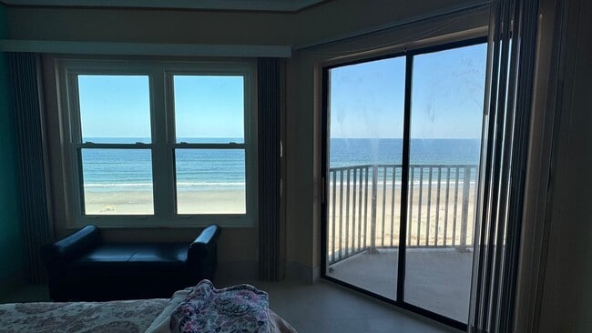 Building Photo - Furnished Beach Front Condo!! Enjoy Costal...