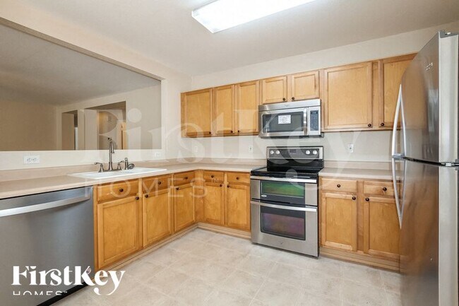 Building Photo - 15552 W Port Au Prince Ln