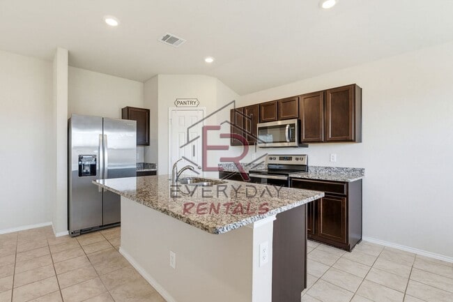 Building Photo - Beautiful Home Awaits you!