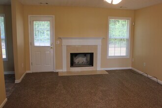 Building Photo - Beautiful Brick Front 3 Bedroom, 2 Bath Home with a 2 Car Garage.