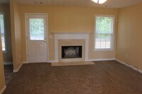 Building Photo - Beautiful Brick Front 3 Bedroom, 2 Bath Home with a 2 Car Garage.