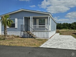 Building Photo - 6691 Hidden Oaks Dr
