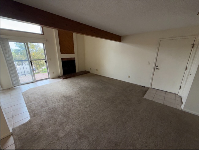 Building Photo - Spacious with sky light and loft!