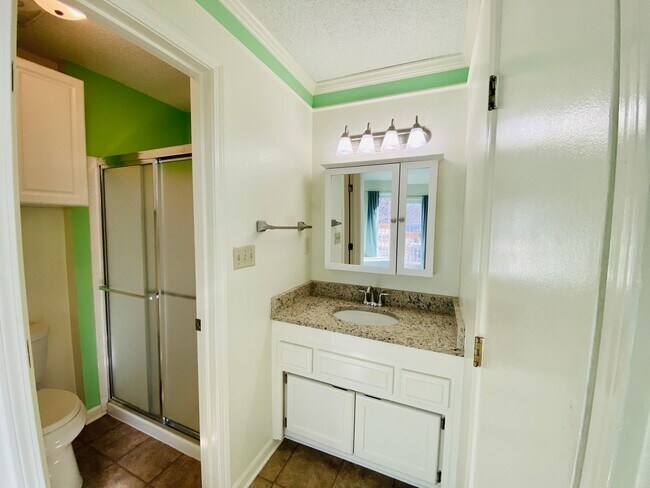 Building Photo - {12030 - F}  Updated Condo in Fantastic Location + Top Floor + Covered Parking Included + Private...