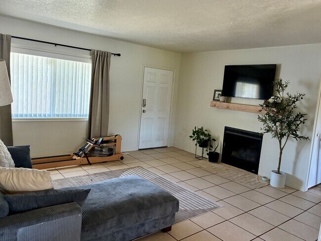 Building Photo - Beautifully remodeled home with central air, 1 car garage, RV parking and covered patio