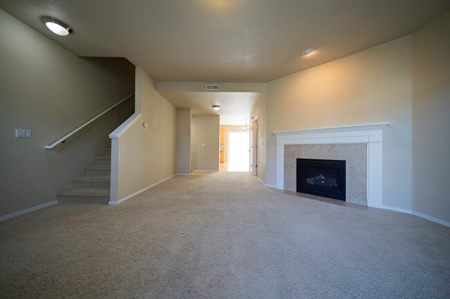 Living room, mantle and gas fireplace - 4828 SE Teakwood St