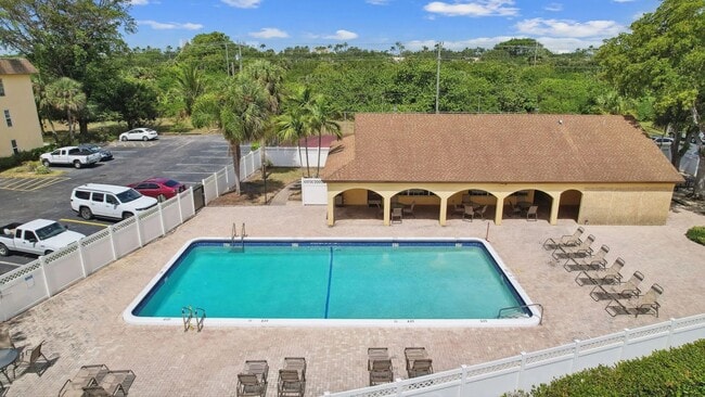 Building Photo - 5-Min Walk to FAU – Private Room in Furnished 2/2 Condo w/ Pool & Canal Views – $1,700