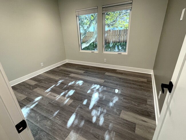 Bedroom with recessed dimmable lighting, ceiling fan, dual pane windows and ceiling fan - 3211 W Alameda Ave