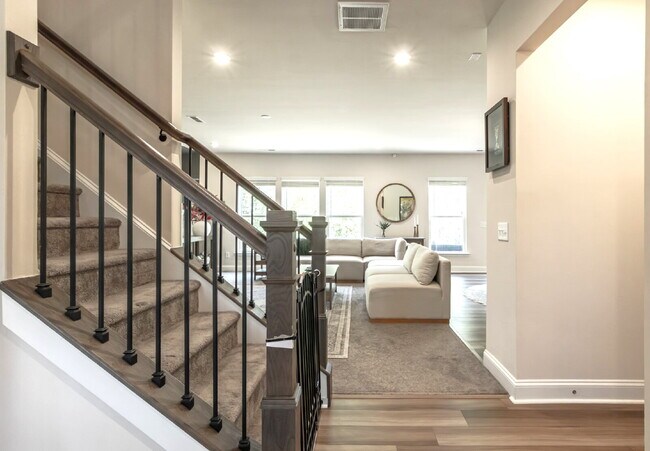 Building Photo - "Discover Spacious Living: 5-Bedroom Craftsman Home in Gated and Amenity-Rich Bretagne with Top-R...