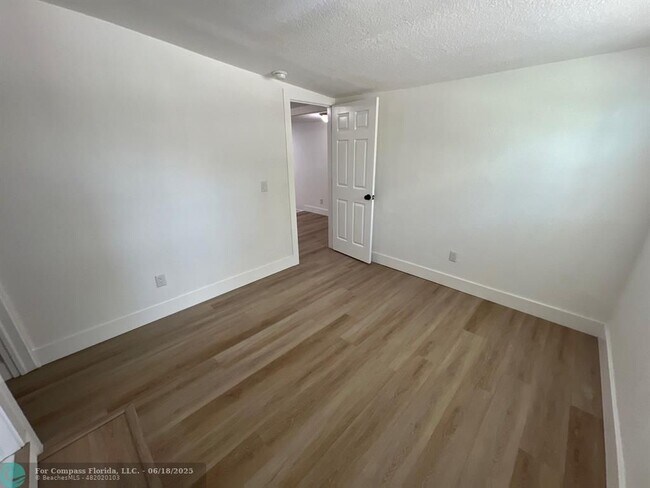 Building Photo - 10540 NW 28th Ave