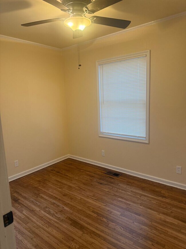 Building Photo - Step into this beautifully updated 1950's gem, where charm meets modern convenience