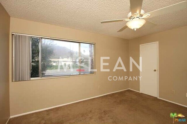 Building Photo - Spacious 4-Bedroom Condo in Indian Canyon Gardens – Palm Springs Living at Its Best!