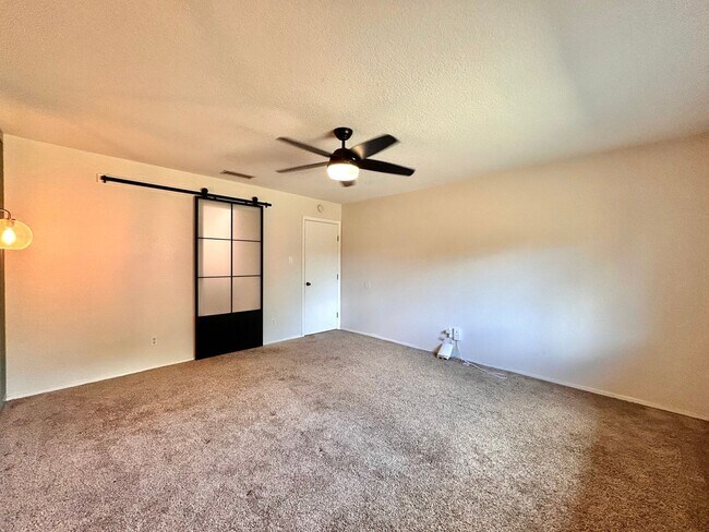 Building Photo - Cozy 3-Bedroom, 2-Bath Home with Covered D...