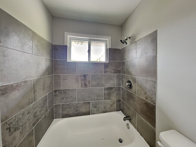 Building Photo - 7745 Madrid Ave