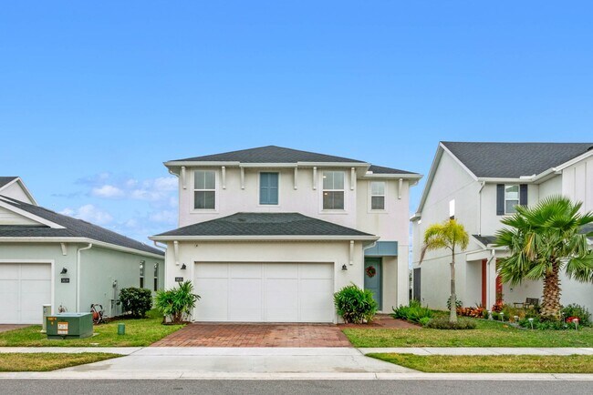 Building Photo - Water Front Home- 4 Large Bedrooms-3 baths Gated Community Call Sheila Campbell 407-687-7900