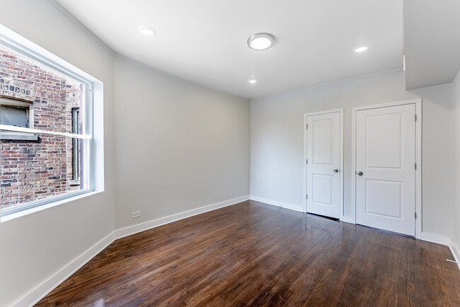 Building Photo - 1121 N Leclaire Ave