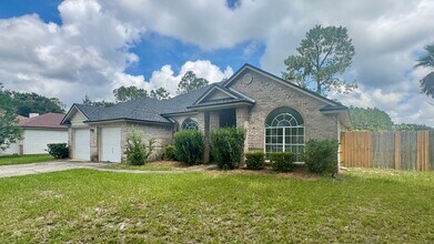 Building Photo - Bright & Spacious Home with 2 Car Attached...