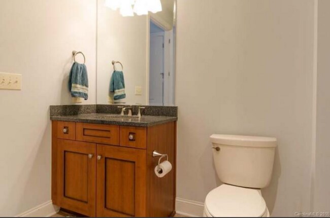 Bathroom has medicine cabinets now, not shown in pictures - 230 S Tryon St