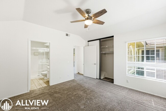 Building Photo - Fully Renovated 2 Bed Townhome with Private Patio, 2-Car Garage & Community Pool