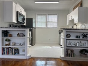 Building Photo - $999 - Charming Furnished Single-Family Un...