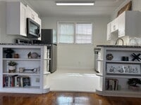 Building Photo - $999 - Charming Furnished Single-Family Un...