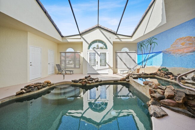 Building Photo - "Waterfront home with Courtyard Pool"