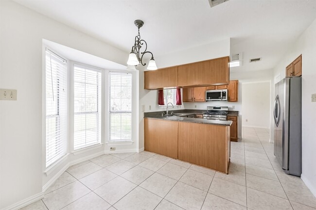 Building Photo - 7063 River Garden Dr