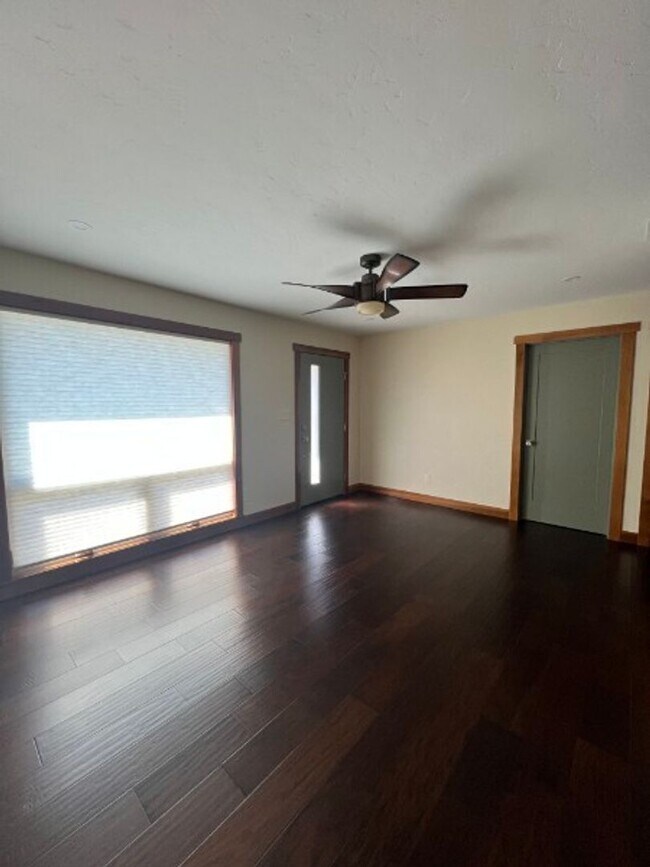 Building Photo - Artisan-Built Custom Cottage Retreat | Private Yard, Garage & EV Charging Ready