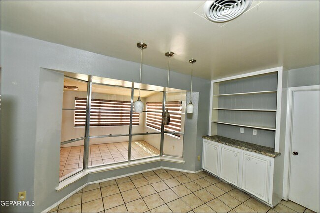 Building Photo - 9125 W H Burges Dr