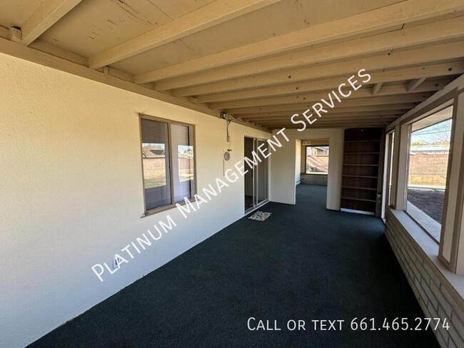 Building Photo - 1839 E Ave Q10