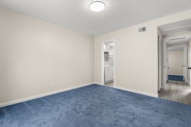 Building Photo - Charming Updated Home With Drive-Through Garage Access