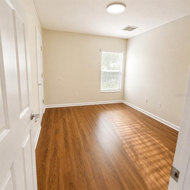 Building Photo - 10222 Pink Palmata Ct