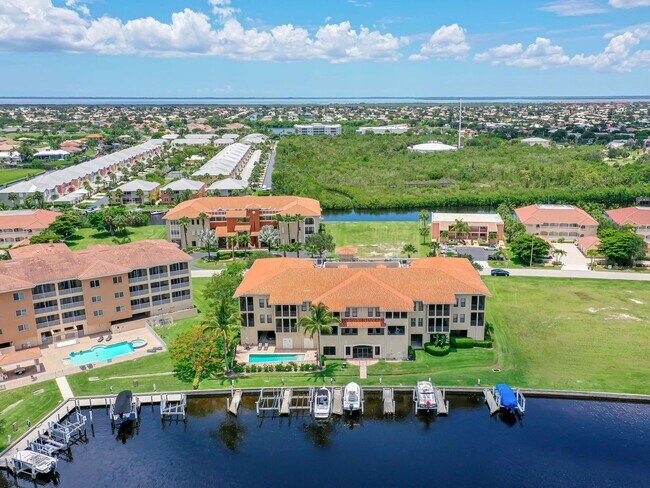 Building Photo - BEAUTIFUL 3-BEDROOM  WATERFRONT CONDO WITH BOAT SLIP AND HEATED POOL