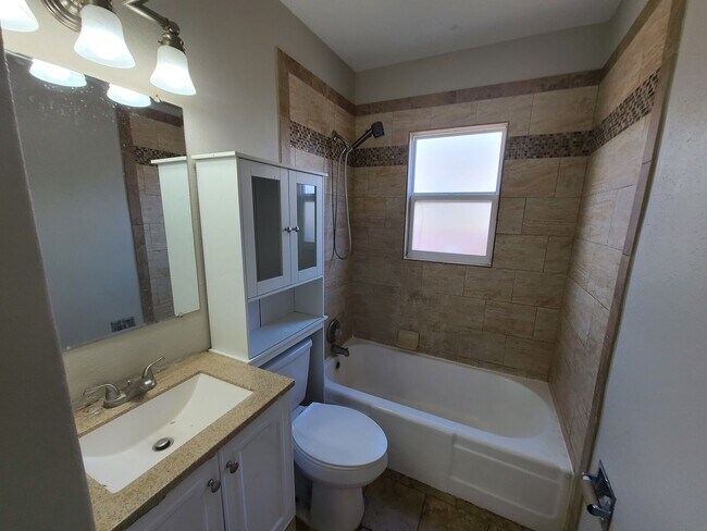 Building Photo - Three Bedrooms One Bathroom with Shaded Porch