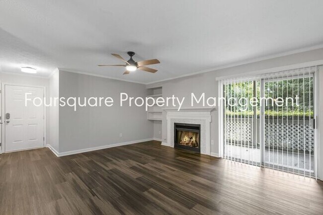Building Photo - Charming 1st-Floor End-Unit Condo with Gas Log Fireplace, Private Back Porch & Community Pool – T...