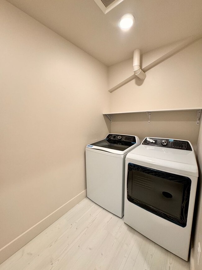 Building Photo - Modern, Spacious 3-Bedroom Townhome in the...