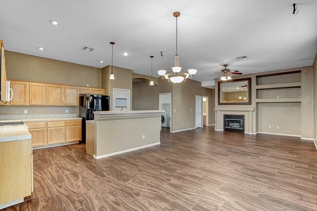 Building Photo - Gorgeous NW Single Story! 3 Car Garage! Serene Backyard.