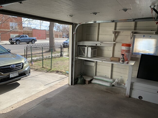 Electric garage door. - 322 E 19th St