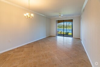 Building Photo - Stunning 2BR/2BA Acqua Ct. First-Floor Uni...