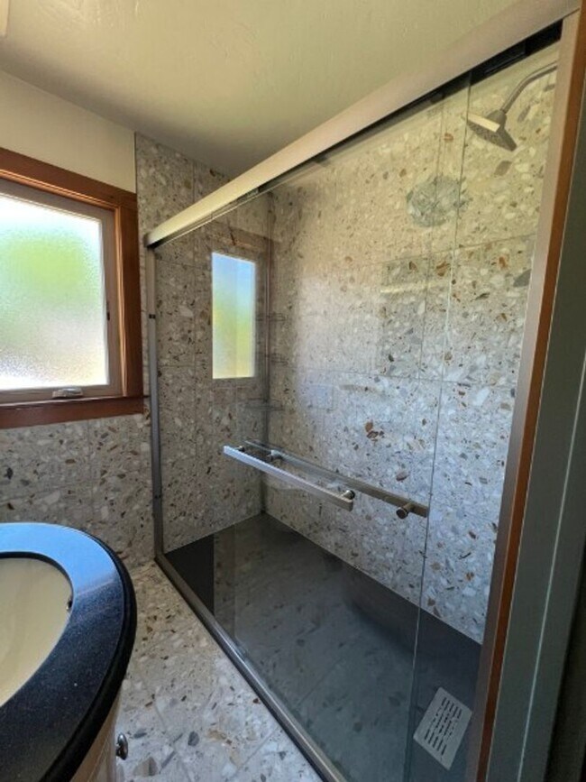 Building Photo - Artisan-Built Custom Cottage Retreat | Private Yard, Garage & EV Charging Ready