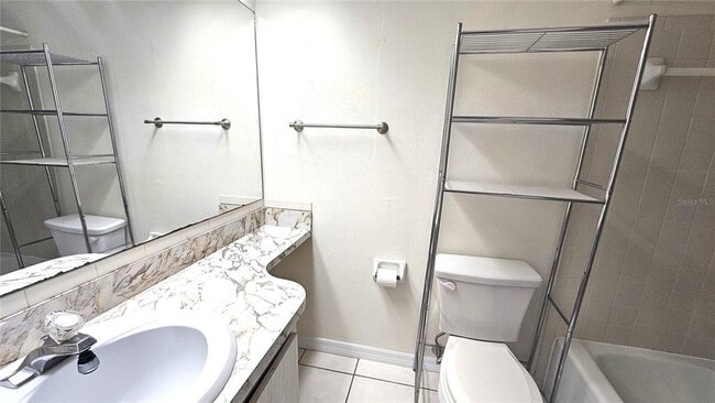 Building Photo - 8 Quails Run Blvd