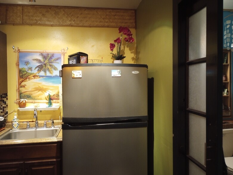 Full size Refrig. SS. Sink (bathroom door shown to R) - 281 Kaikea St
