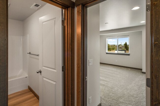 Building Photo - Pet Friendly! Gorgeous 3 Bedroom condo with double stall attached garages with AC.