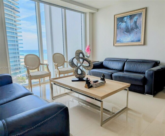 Building Photo - 10275 Collins Ave